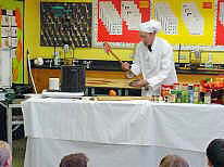 Mr. Grambo uses an Axe to cut tomatoes !