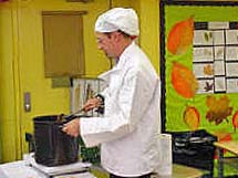 Mr. Grambo uses a spoon!